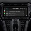 Dashboard van CarPlay Ultra met radio miniatuur