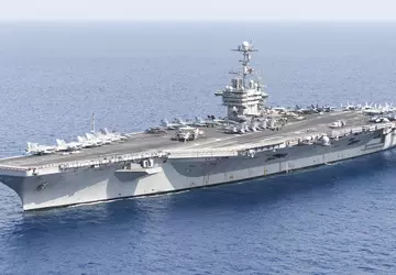 Het Amerikaanse vliegdekschip USS Harry S. ...